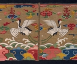 Kraniche und Schriftzeichen shou („Langes Leben“)